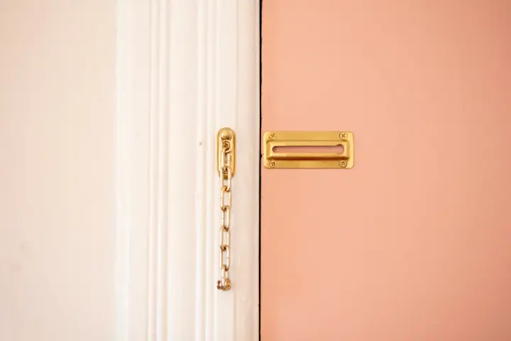 Pink door with gold lock